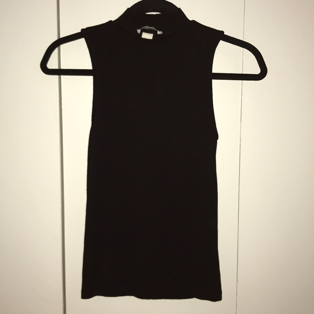 black form fitting turtle neck tank top